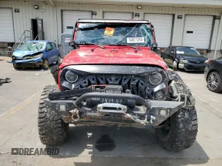 2014 Jeep Wrangler Sport with VIN 1C4AJWAG4EL205584, listed as a Copart auction lot 63671245 with Not provided miles and Salvage title. Bid and sale history available at DreamBid. Image 5.