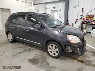 2008 Kia Rondo LX Base with VIN KNAFG525287212765, listed as a Copart auction lot 87700005 with 286,337 mi miles and Salvage Title. Bid and sale history available at carsss.com. Image 4.