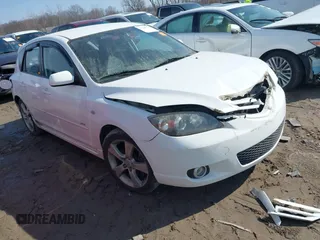 2005 Mazda 3 s with VIN JM1BK143251317468, listed as a IAAI auction lot 41768734 with 156,434 mi miles. Bid and sale history available at carsss.com. Image 1.
