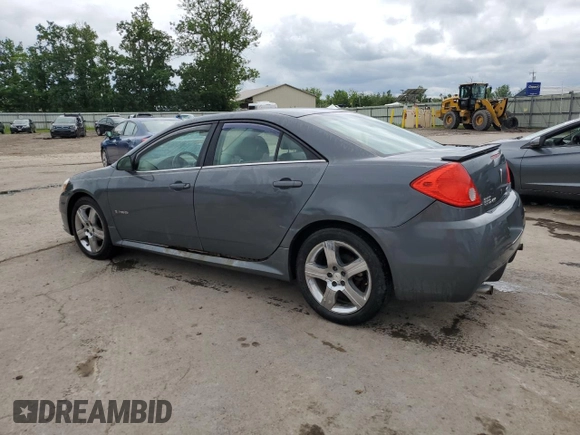 2009 Pontiac G6 GXP 1SA with VIN 1G2ZM577294217264, listed as a Copart auction lot 63824735 with 165,948 mi miles and Salvage title. Bid and sale history available at DreamBid. Image 2.
