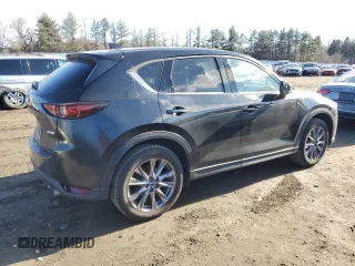 2019 Mazda CX-5 Grand Touring with VIN JM3KFBDM0K0571806, listed as a Copart auction lot 43395105 with 57,768 mi miles and Salvage Title. Bid and sale history available at carsss.com. Image 3.