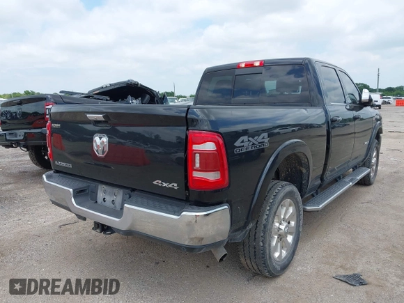 2022 Ram 2500 Laramie with VIN 3C6UR5FJ2NG305658, listed as a IAAI auction lot 42362662 with 50,701 mi miles and . Bid and sale history available at DreamBid. Image 4.