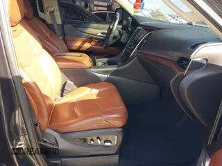 2017 Cadillac Escalade Premium Luxury z VIN 1GYS4CKJ5HR293450, wystawiony jako IAAI lot #41951478 z przebiegiem 51 882 mil mil oraz . Historia ofert i sprzedaży dostępna na DreamBid. Obrazek 5.