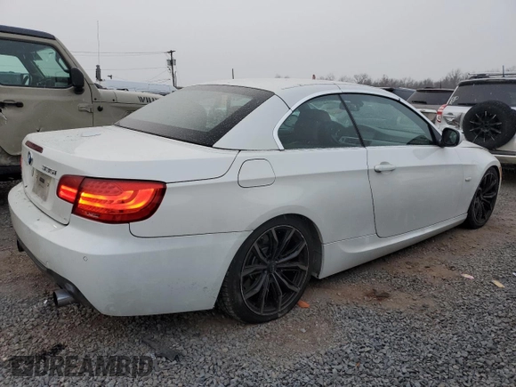 2013 BMW 3 Series 335i with VIN WBADX7C51DJ590221, listed as a Copart auction lot 88928575 with 98,558 mi miles and Salvage Title. Bid and sale history available at DreamBid. Image 3.