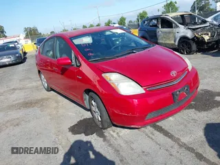 2007 Toyota Prius z VIN JTDKB20U977661576, wystawiony jako IAAI lot #42163755 z przebiegiem 142 012 mil mil oraz . Historia ofert i sprzedaży dostępna na DreamBid. Obrazek 1.