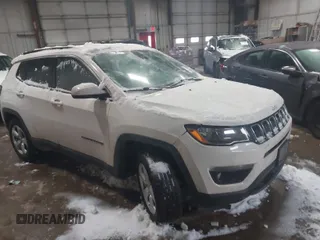 2020 Jeep Compass Latitude with VIN 3C4NJDBB3LT138454, listed as a IAAI auction lot 41614631 with 82,079 mi miles. Bid and sale history available at carsss.com. Image 1.
