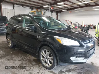 2015 Ford Escape Titanium with VIN 1FMCU9J98FUC70495, listed as a IAAI auction lot 41978543 with 129,974 mi miles. Bid and sale history available at carsss.com. Image 1.