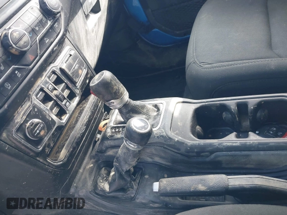 2022 Jeep Gladiator Willys z VIN 1C6JJTAM4NL130350, wystawiony jako IAAI lot #41964484 z przebiegiem Nie podano mil oraz . Historia ofert i sprzedaży dostępna na DreamBid. Obrazek 14.