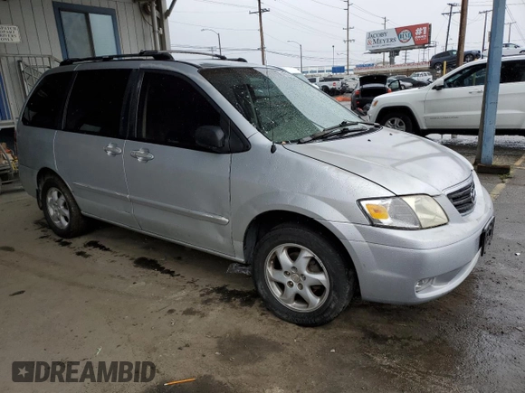 2000 Mazda MPV DX с VIN JM3LW28G7Y0129123, выставлен на аукционе Copart как лот 49331495 с пробегом 155 395 миль миль и Списание • Salvage title. История ставок и продаж доступна на DreamBid. Изображение 4.