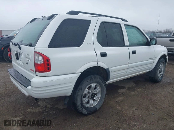 2001 Isuzu Rodeo S with VIN 4S2DM58WX14315138, listed as a IAAI auction lot 41535619 with 217,960 mi miles and . Bid and sale history available at DreamBid. Image 4.