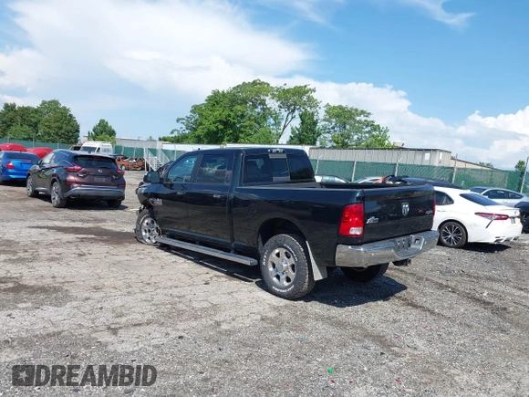 2018 Ram 2500 SLT with VIN 3C6TR5DT2JG166397, listed as a IAAI auction lot 42551256 with 100,040 mi miles and . Bid and sale history available at DreamBid. Image 3.