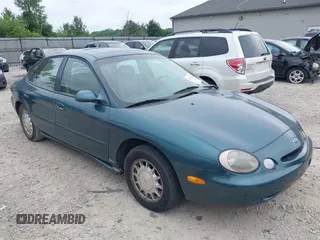 1996 Ford Taurus LX with VIN 1FALP53S3TG177324, listed as a IAAI auction lot 42622520 with 126,979 mi miles and . Bid and sale history available at DreamBid. Image 1.