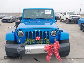 2014 Jeep Wrangler Arctic z VIN 1C4GJWBG3EL313350, wystawiony jako IAAI lot #41442520 z przebiegiem Nie podano mil oraz . Historia ofert i sprzedaży dostępna na DreamBid. Obrazek 6.