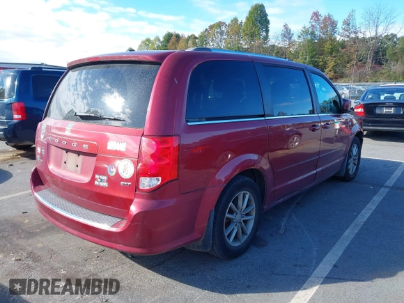 2014 Dodge Grand Caravan SXT with VIN 2C4RDGCG8ER311850, listed as a IAAI auction lot 40598088 with 138,010 mi miles and . Bid and sale history available at DreamBid. Image 4.