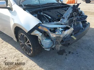 2014 Toyota Corolla L with VIN 2T1BURHE1EC081542, listed as a IAAI auction lot 42124018 with 94,099 mi miles and . Bid and sale history available at DreamBid. Image 6.