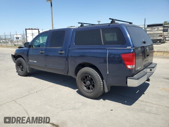 2012 Nissan Titan SV with VIN 1N6AA0ED3CN331091, listed as a Copart auction lot 57805625 with 106,693 mi miles and Salvage title. Bid and sale history available at DreamBid. Image 2.
