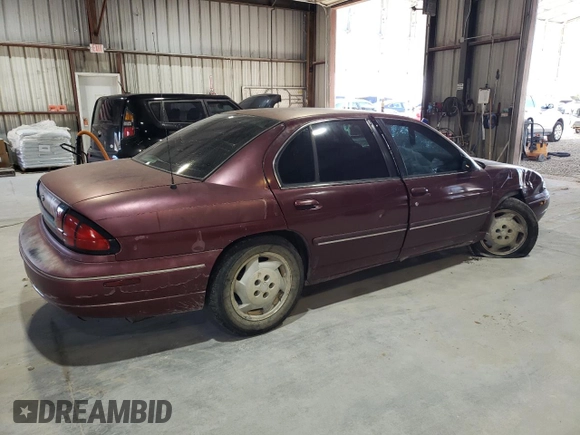 1998 Chevrolet Lumina LS with VIN 2G1WL52M2W1123447, listed as a Copart auction lot 79516084 with 265,125 mi miles and Salvage Title. Bid and sale history available at DreamBid. Image 3.