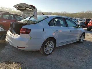 2017 Volkswagen Jetta SEL с VIN 3VWL17AJ5HM312931, выставлен на аукционе Copart как лот 52101195 с пробегом 37 192 миль миль и Списание • Salvage title. История ставок и продаж доступна на DreamBid. Изображение 3.