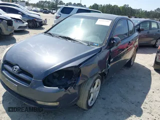2007 Hyundai Accent SE z VIN KMHCN36C27U050012, wystawiony jako IAAI lot #42112316 z przebiegiem 172 070 mil mil oraz . Historia ofert i sprzedaży dostępna na DreamBid. Obrazek 17.