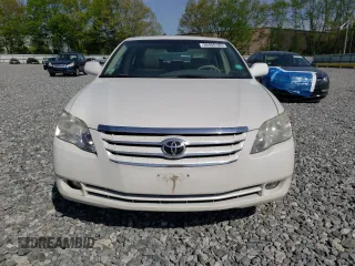 2007 Toyota Avalon XL z VIN 4T1BK36B27U215021, wystawiony jako Copart lot #56408185 z przebiegiem 202 572 mil mil oraz Czysty tytuł • Clean title. Historia ofert i sprzedaży dostępna na DreamBid. Obrazek 5.