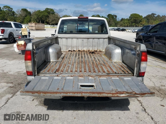 1998 Nissan Frontier XE z VIN 1N6DD21S8WC342950, wystawiony jako Copart lot #42089915 z przebiegiem Nie podano mil oraz Szkoda całkowita • Salvage title. Historia ofert i sprzedaży dostępna na DreamBid. Obrazek 6.