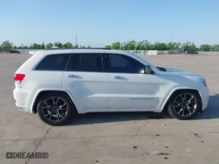 2014 Jeep Grand Cherokee Overland with VIN 1C4RJFCG6EC579985, listed as a IAAI auction lot 42025215 with 126,761 mi miles. Bid and sale history available at carsss.com. Image 14.