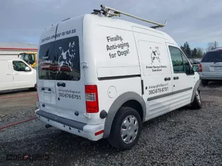 2012 Ford Transit Connect XLT with VIN NM0LS7DN2CT106410, listed as a IAAI auction lot 41753928 with 127,352 mi miles. Bid and sale history available at carsss.com. Image 4.