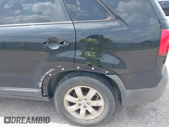 2013 Kia Sorento LX with VIN 5XYKT3A67DG359284, listed as a IAAI auction lot 42644742 with 258,998 mi miles and . Bid and sale history available at DreamBid. Image 12.
