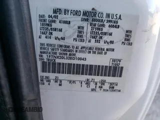2002 Ford F-250 XL with VIN 1FTNX20L32ED10043, listed as a Copart auction lot 82608574 with 150,324 mi miles and Salvage title. Bid and sale history available at DreamBid. Image 12.
