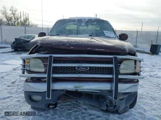 2000 Ford F-150 XL with VIN 1FTRX18L2YNA50128, listed as a IAAI auction lot 40956879 with 1 mi miles. Bid and sale history available at carsss.com. Image 11.