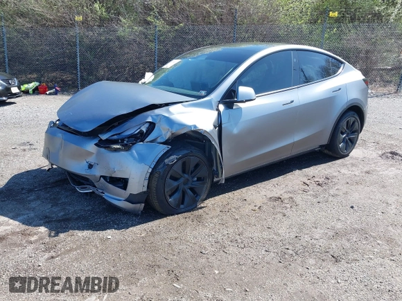 2024 Tesla Model Y Long Range with VIN 7SAYGDEE2RA311261, listed as a IAAI auction lot 41534010 with Not Provided miles and . Bid and sale history available at DreamBid. Image 2.