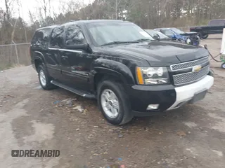 2011 Chevrolet Suburban LT with VIN 1GNSKJE31BR352277, listed as a IAAI auction lot 41493779 with 210,296 mi miles. Bid and sale history available at carsss.com. Image 1.