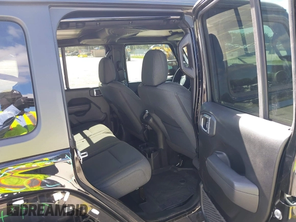 2024 Jeep Wrangler Sport S with VIN 1C4PJXDG7RW325735, listed as a IAAI auction lot 41309348 with 3,577 mi miles and . Bid and sale history available at DreamBid. Image 8.