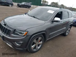 2014 Jeep Grand Cherokee Overland with VIN 1C4RJFCGXEC172008, listed as a IAAI auction lot 41719313 with 164,682 mi miles. Bid and sale history available at carsss.com. Image 14.