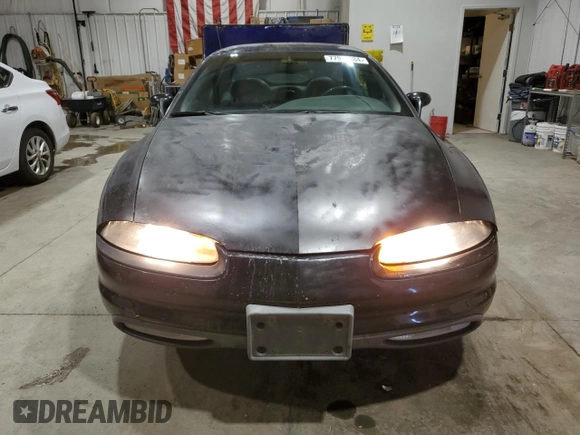 1999 Oldsmobile Aurora with VIN 1G3GR62C8X4117519, listed as a Copart auction lot 77984084 with 188,949 mi miles and Clean Title. Bid and sale history available at DreamBid. Image 5.