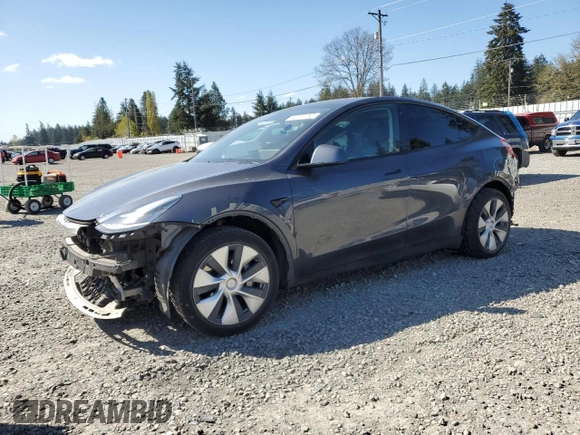 2020 Tesla Model Y Long Range with VIN 5YJYGDEEXLF017789, listed as a Copart auction lot 52705185 with 49,470 mi miles and Salvage Title. Bid and sale history available at DreamBid. Image 1.