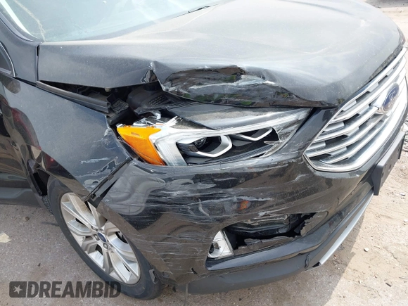 2019 Ford Edge Titanium z VIN 2FMPK3K91KBB95867, wystawiony jako IAAI lot #41798923 z przebiegiem 39 942 mil mil oraz . Historia ofert i sprzedaży dostępna na DreamBid. Obrazek 6.