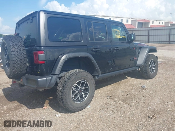 2024 Jeep Wrangler Rubicon with VIN 1C4PJXFG0RW271322, listed as a IAAI auction lot 42736647 with 32,319 mi miles and . Bid and sale history available at DreamBid. Image 4.