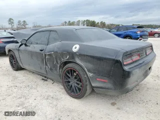 2016 Dodge Challenger SXT Plus with VIN 2C3CDZAG7GH309282, listed as a Copart auction lot 42331215 with 155,153 mi miles and Salvage Title. Bid and sale history available at carsss.com. Image 2.