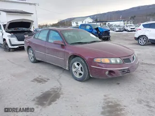 2001 Pontiac Bonneville SE with VIN 1G2HX54K914293726, listed as a IAAI auction lot 41373612 with 120,117 mi miles. Bid and sale history available at carsss.com. Image 1.