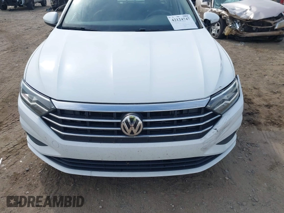 2021 Volkswagen Jetta S z VIN 3VWC57BU0MM021874, wystawiony jako IAAI lot #42124747 z przebiegiem 89 887 mil mil oraz . Historia ofert i sprzedaży dostępna na DreamBid. Obrazek 12.