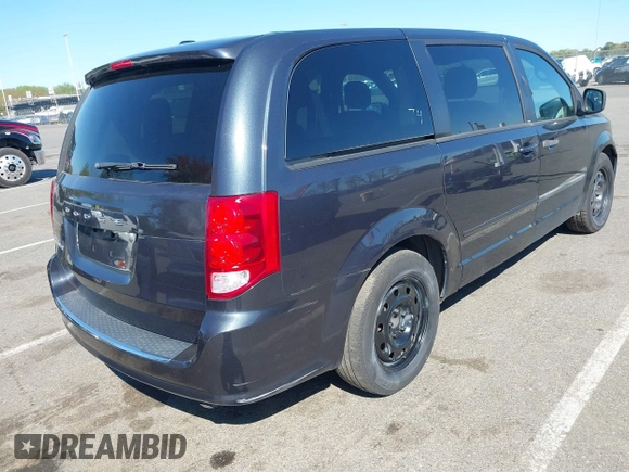 2014 Dodge Grand Caravan SE with VIN 2C4RDGBGXER254634, listed as a IAAI auction lot 42149494 with 158,614 mi miles and . Bid and sale history available at DreamBid. Image 4.