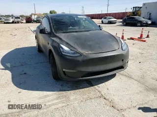 2021 Tesla Model Y Long Range z VIN 5YJYGDEE5MF275302, wystawiony jako Copart lot #54353875 z przebiegiem 63 196 mil mil oraz Szkoda całkowita • Salvage title. Historia ofert i sprzedaży dostępna na DreamBid. Obrazek 13.