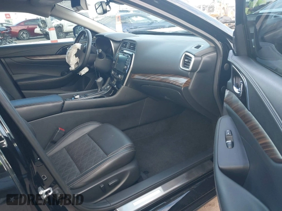 2018 Nissan Maxima SV with VIN 1N4AA6AP4JC398478, listed as a IAAI auction lot 41619733 with 132,867 mi miles and . Bid and sale history available at DreamBid. Image 5.