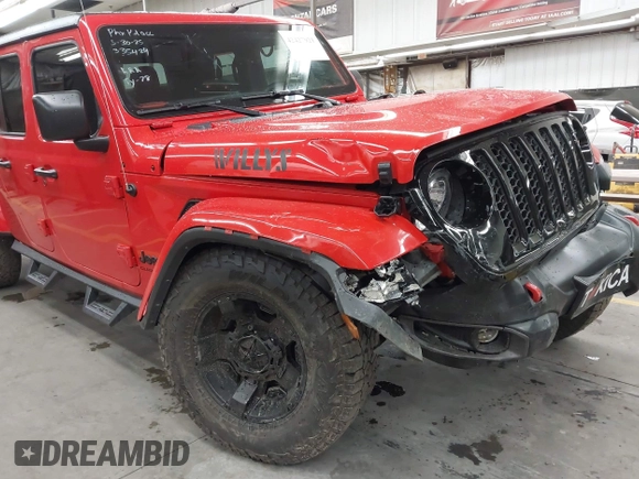 2022 Jeep Gladiator Altitude z VIN 1C6HJTAGXNL117353, wystawiony jako IAAI lot #42427921 z przebiegiem 28 801 mil mil oraz . Historia ofert i sprzedaży dostępna na DreamBid. Obrazek 6.