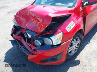 2013 Chevrolet Sonic LT with VIN 1G1JC5SH4D4169926, listed as a IAAI auction lot 41930121 with 105,351 mi miles and . Bid and sale history available at DreamBid. Image 6.