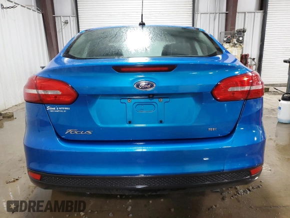 2015 Ford Focus SE with VIN 1FADP3F28FL237744, listed as a Copart auction lot 62307855 with 164,794 mi miles and Salvage title. Bid and sale history available at DreamBid. Image 6.