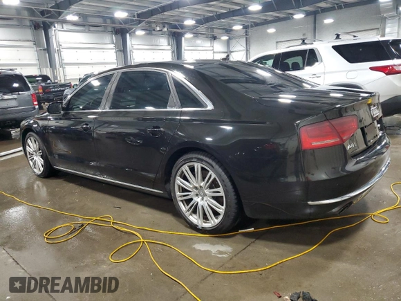 2011 Audi A8 z VIN WAURVAFD8BN005569, wystawiony jako Copart lot #52101065 z przebiegiem 104 893 mil mil oraz Szkody całkowita. Historia ofert i sprzedaży dostępna na DreamBid. Obrazek 2.