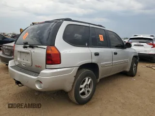 2005 GMC Envoy SLT with VIN 1GKDT13S152124404, listed as a Copart auction lot 64011494 with 212,951 mi miles and Salvage Title. Bid and sale history available at DreamBid. Image 3.