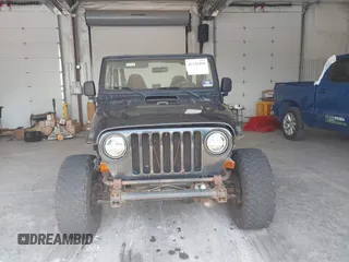1999 Jeep Wrangler Sport with VIN 1J4FY19S4XP494405, listed as a IAAI auction lot 42542416 with 168,856 mi miles and . Bid and sale history available at DreamBid. Image 12.